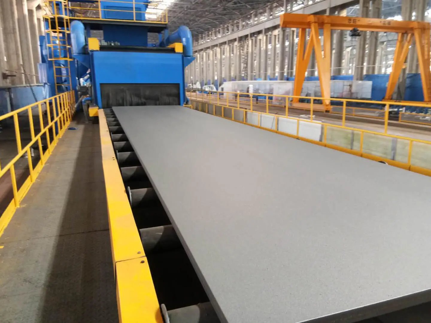 How Does Steel Plate Shot Blasting Machine Handle Environmental and Safety Concerns?